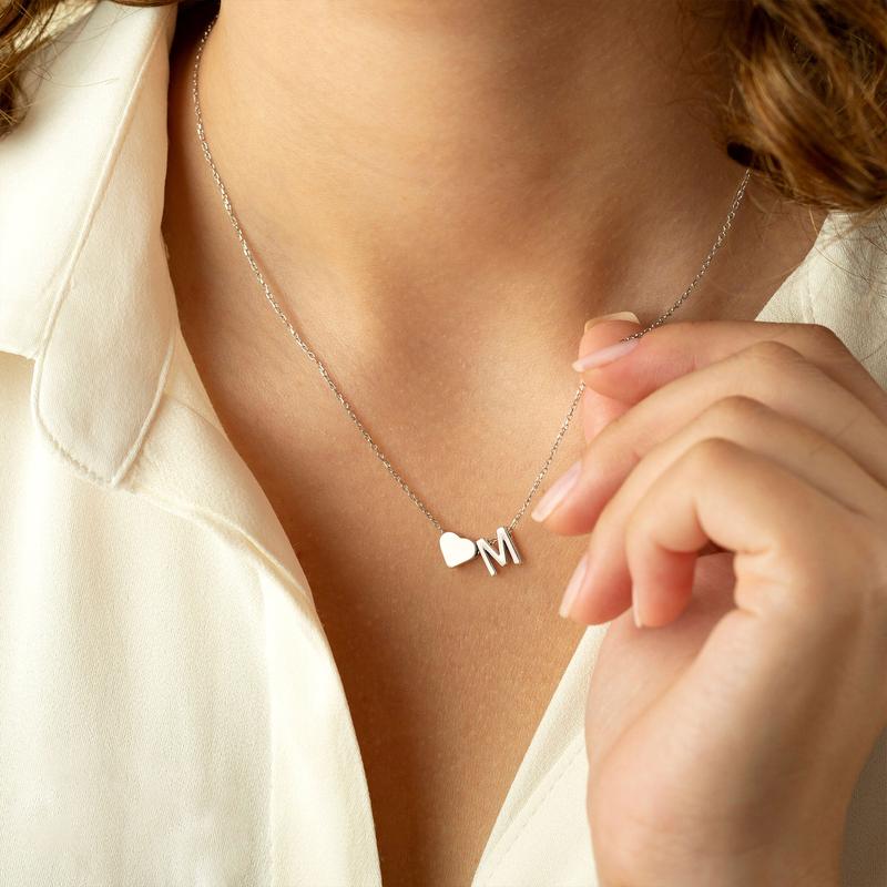 Personalized heart necklace with initial engraving, featuring a romantic lover's design from ismijewels.