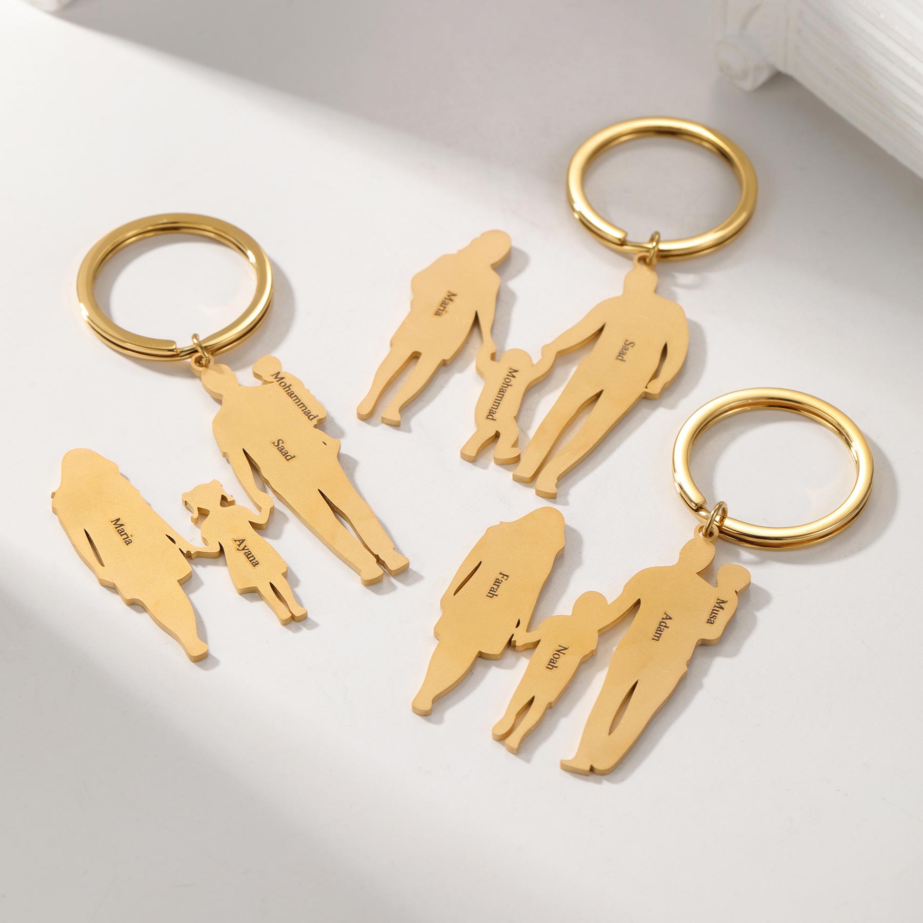 Custom 3-figure family keychain from mySite featuring personalized family member figures on a durable keychain.