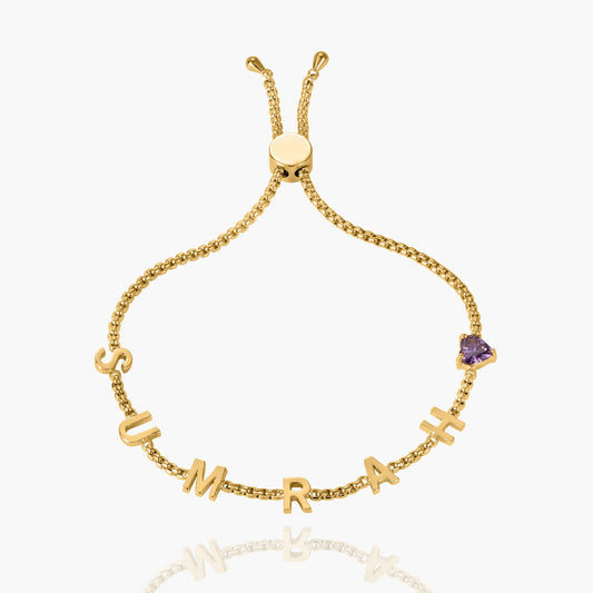Personalized gold heart birthstone bracelet with engraved details, showcasing vibrant gemstones and elegant design from mySite.