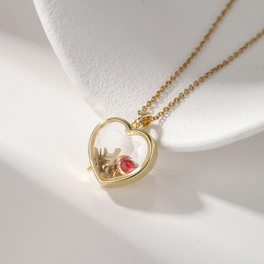 Personalized ismijewels heart locket necklace with charms, featuring intricate design and space for custom engravings and charms.
