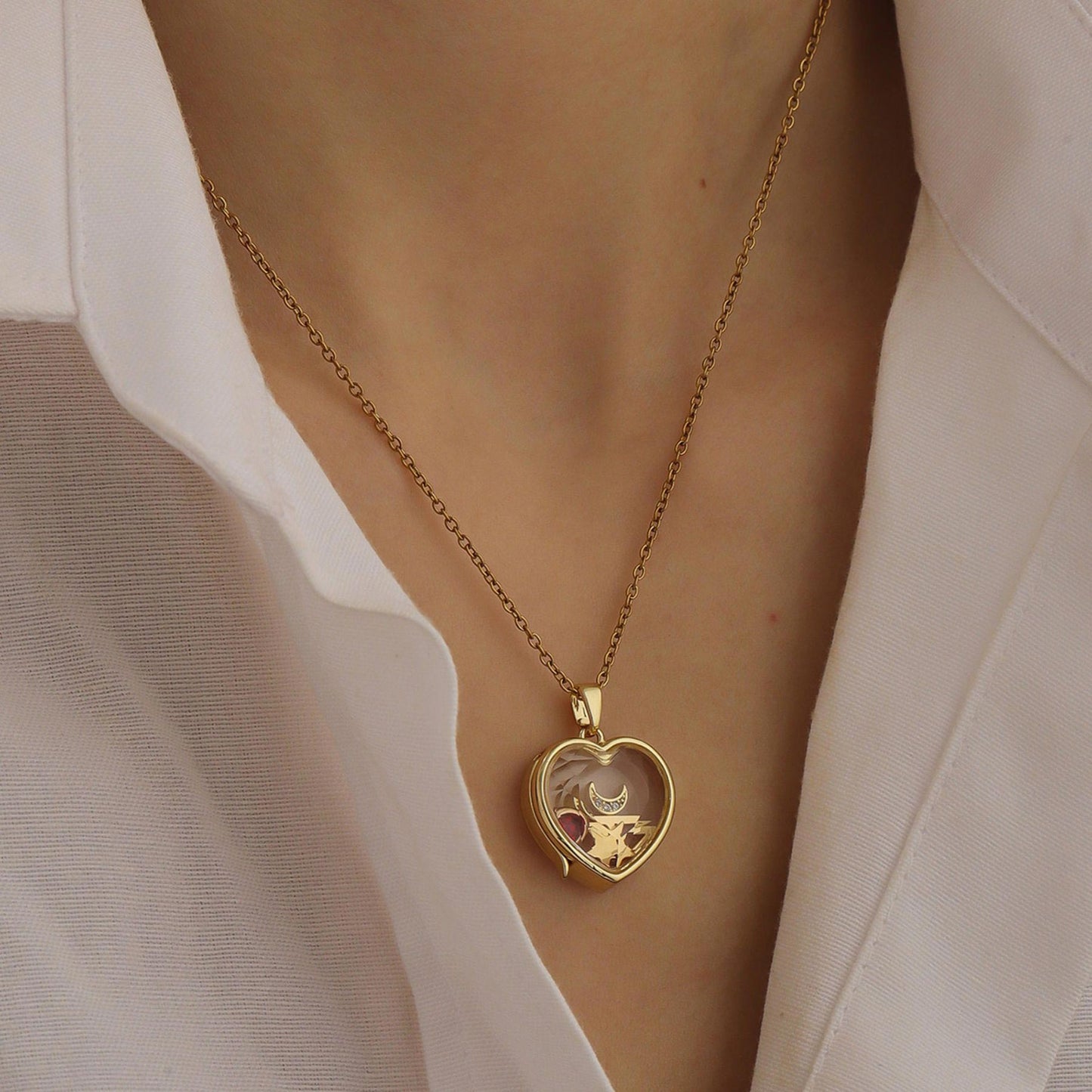 Personalized ismijewels heart locket necklace with engraved charms and intricate details, designed for custom jewelry collection.
