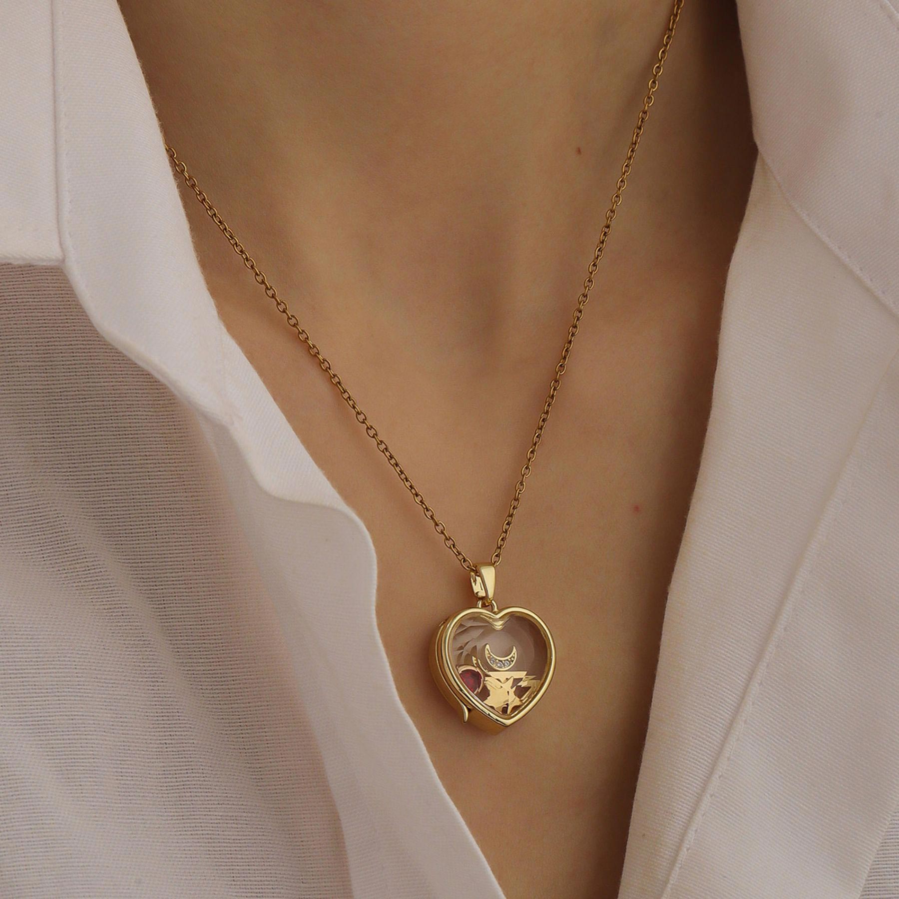Personalized ismijewels heart locket necklace with engraved charms and intricate details, designed for custom jewelry collection.